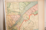 Detail of Cram's 1907 Quebec map, highlighting faded regional colors and worn edge.
