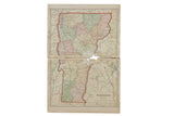 Cram's 1907 Map of Vermont with soft pastel county colors and visible central tear.