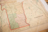 Vintage 1907 Cram's Vermont map detail with pale green Bennington county and aged texture.