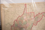 1907 West Virginia map section, highlighting pastel counties, text, and the paper's storied patina.