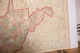 Aged lower right view of the 1907 West Virginia map, pastel counties, page edge.