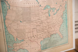 Angled view of Cram's 1907 USA Map, central-western states in muted peach and teal.