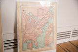 Angled close-up of the 1907 Cram's map, showing Virginia and North Carolina with aged edges.