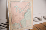 Cram's 1907 US History Map showing pale pink land, light blue water, and aged paper edges.