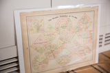 Central title and colorful data diagrams on the 1907 Cram's World Statistics map.