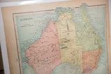 Detail of Cram's 1907 Australia map, aged pink and yellow western regions and blue ocean.