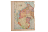 Cram's 1907 Map of Africa with colorful regions and naturally aged, torn edges.