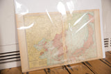 Cram's 1907 map of Korea, showing its central fold, pale green land, and aged paper.