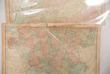 Vintage Russia map detail showing pastel colored regions and aged paper.