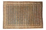 Finely woven antique Haji Jalili Tabriz rug with navy and ivory allover boteh design.