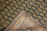 Antique Haji Jalili Tabriz rug corner, revealing its precise hand-knotted foundation and secured selvage.