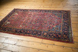 Antique Kashan rug in tree-of-life style, featuring leopards, peacocks, and dense florals.