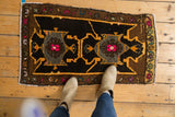 Playful village weave Oushak rug, displaying bold tangerine orange and hot pink fuchsia patterns.