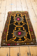 Vintage Oushak rug: Bold asymmetric motifs of charcoal, oxidized silver, tangerine, fuchsia.