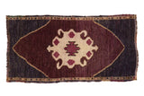Distressed vintage Oushak rug mat with bold eggplant, ivory, and dark navy village weave. 1'5