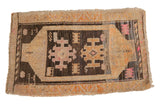 Vintage distressed Oushak rug with charcoal, ivory, and pink asymmetric village weave. 1'10