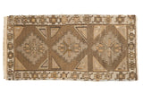 Vintage distressed Jijim hand-woven runner with triple diamond medallions in brown, ivory, and silver.