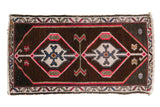 Distressed Oushak mat with double diamond medallions, ram's horn finials, hot pink, sky blue, and ivory. 1'5