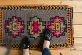 Distressed vintage Oushak rug with triple geometric medallions in hot pink and saffron.