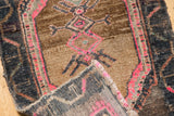 Vintage Distressed Oushak rug mat, hot pink geometric pattern, with intact selvage.