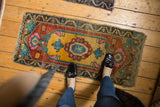 Funky distressed Oushak runner with vibrant gold lozenge medallion and hot pink accents.