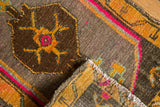 Oushak rug corner: original selvage, knot wear, saffron yellow, and hot pink motifs.