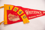 Yellow 1940 numbers and white 'Whiteface Memorial Highway' text on red felt pennant.