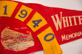 Yellow felt '1940' numbers with blue digits on a red vintage Whiteface pennant.