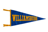 Vintage 1930s Williamsburg felt pennant in blue with yellow-gold block lettering and side ties.