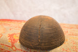 Vintage Wooden African Bowl with central seam repair and carved geometric patterns.