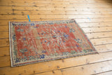 Vintage Oushak rug corner reveals distressed pile, visible foundation, and original side selvage.