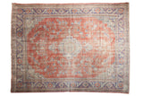 Distressed Oushak carpet, faded cherry red field, ivory medallion, blue floral accents, 7'8
