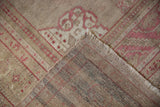 The hand-knotted foundation and reverse weave of a vintage Turkish Oushak carpet.