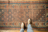 Antique Caucasian rug with trellis field, blossomed florals, geometric border, mostly even wear.