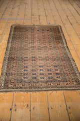 End of Vintage Belouch runner with original fringe, light tatter, and brown shades.