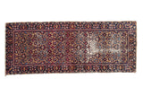 Vintage Yazd runner, allover navy blue, wine red, gold floral field, distinct border, visible wear.