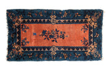 Antique Peking rug runner with apricot field, indigo blue border, central floral design. 2'1