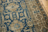 Antique Shirvan rug detail: navy blue, ivory, and beige geometric serrated leaves with mostly even wear.