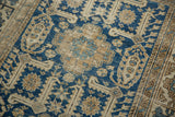 Antique Shirvan rug's navy blue and ivory geometric serrated leaf pattern, with mostly even wear.