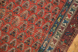 Antique Caucasian runner's madder red boteh field, geometric blue and aubergine borders, with intact selvage and wear.