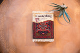 CoasterRug with rare Art Deco Persian Sarouk medallion design, deep red and navy.