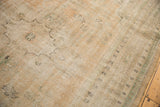Distressed Oushak pile with even wear, foundation visible, in soft apricot, ivory, and ocean green.