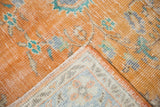 Vintage distressed terra cotta orange pile and light blue woven foundation.
