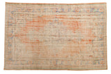 Vintage distressed Oushak carpet, faded apricot orange, ivory, blue, and green borders. 6'3