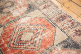 Distressed Oushak runner texture, showing brick cherry red and navy charcoal guls.