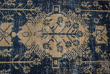 Distressed Oushak rug: antique ivory tree of life pattern on dark navy, visible wear.