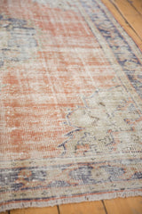 Vintage distressed Oushak rug pile texture with mostly even wear, terra cotta, navy, and ivory.