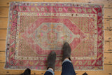 Vintage Distressed Oushak rug, geometric lozenge medallion, blush, aubergine, slate blue, 2'9
