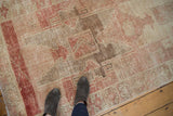 Distressed Oushak runner with faded geometric patterns and soft abrashes.