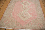 Distressed Turkish Sparta runner texture, rose blush, beige geometric pattern, visible foundation.